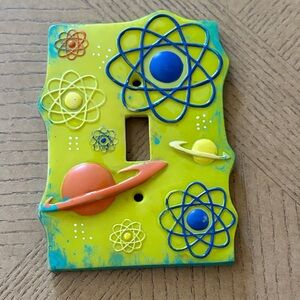 Colorful Atomic Light Switch Toy Story Pixar Cover